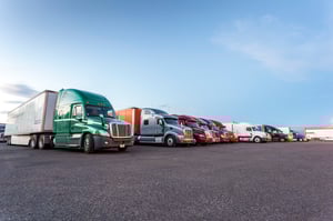 Many American Trucks on Parking Lot.