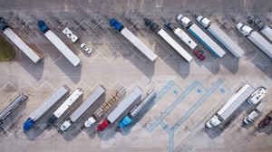 Truck Stop on Rest Area on the Highway. Top View Car Parking Lot. Truck Driver Company. View from the Birds Flight. Aerial Photography. (1)